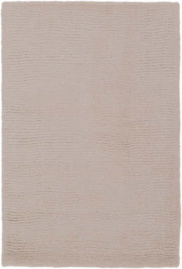 Close-up of the textured, hand loomed Brockton Solid Tan Wool Area Rug. Neutral tan color with subtle striped design. Design-Rectangle-23