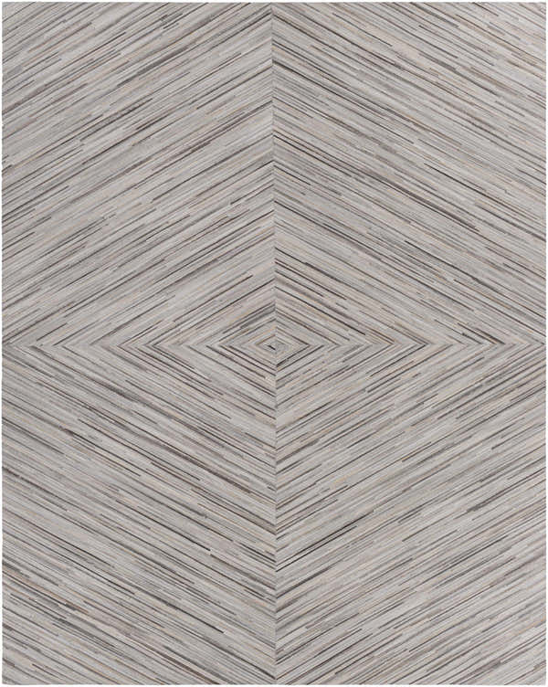 Close-up of the Wauzeka Premium Area Rug. Hair on hide rug with a cream, brown, and gray diamond pattern. Design-Rectangle-810