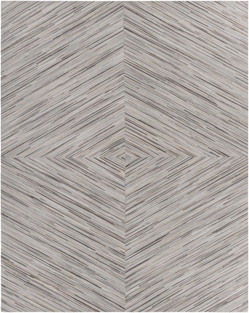 Close-up of the Wauzeka Premium Area Rug. Hair on hide rug with a cream, brown, and gray diamond pattern. Design-Rectangle-810