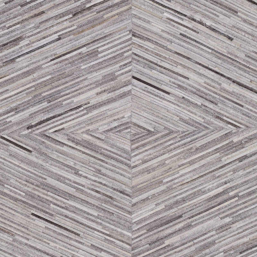 Close-up of Wauzeka Premium Area Rug with a diamond pattern in brown, cream, and gray hair-on-hide strips. Swatch
