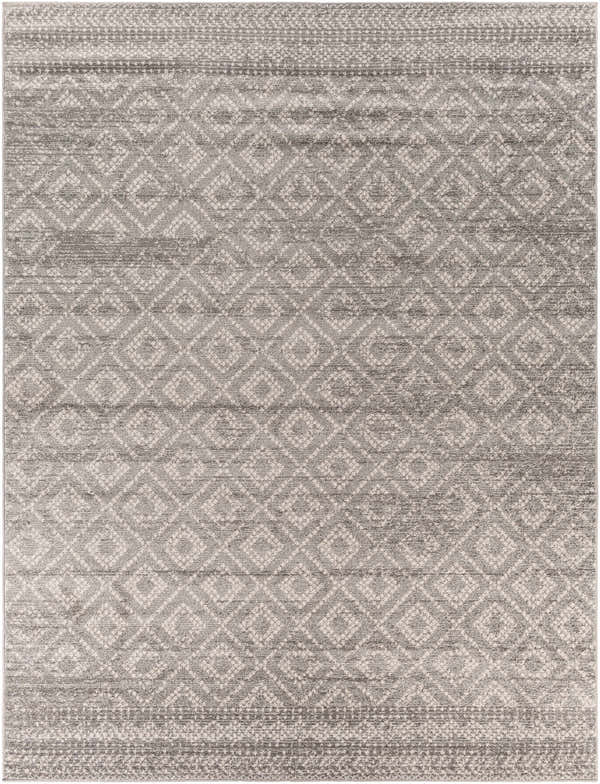Close-up of the Webb Area Rug. Machine-woven polypropylene rug in charcoal, gray, light slate, and white with a geometric pattern. Design-Rectangle-710103