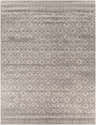 Close-up of the Webb Area Rug. Machine-woven polypropylene rug in charcoal, gray, light slate, and white with a geometric pattern. Design-Rectangle-710103