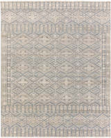 Close-up of the hand-knotted Woodsfield Premium Rug. Features a geometric diamond pattern in beige, brown, and gray wool. Design-Rectangle-810