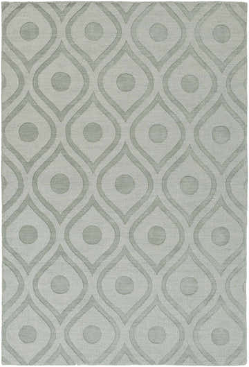 Close-up of the light gray Welaka Eye Pattern Wool Rug, featuring a geometric eye and dot design. Design-Rectangle-576