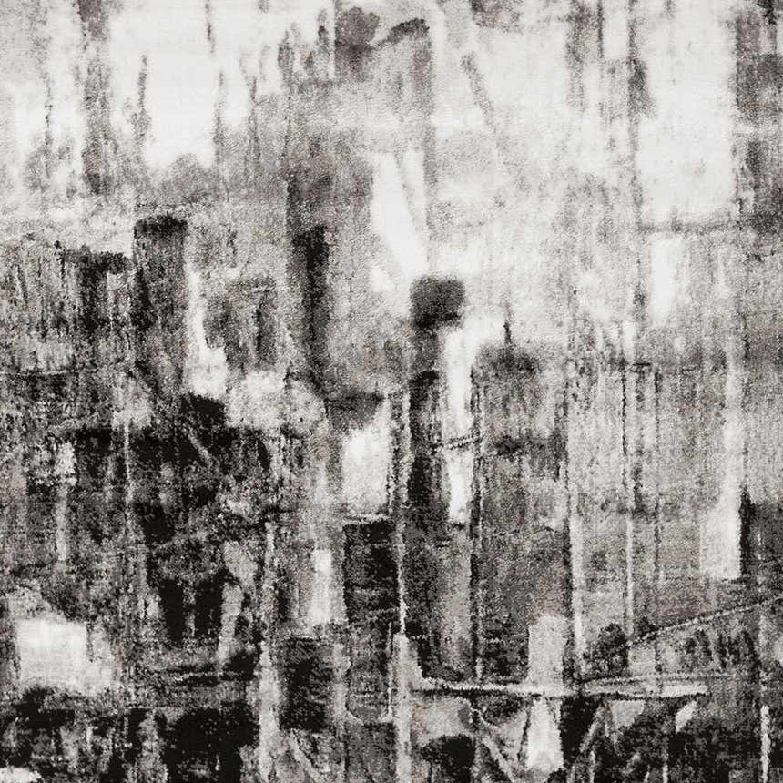 Close-up of the Westpoint Area Carpet, a contemporary rug in black, charcoal, gray, and off-white with an abstract pattern. Swatch