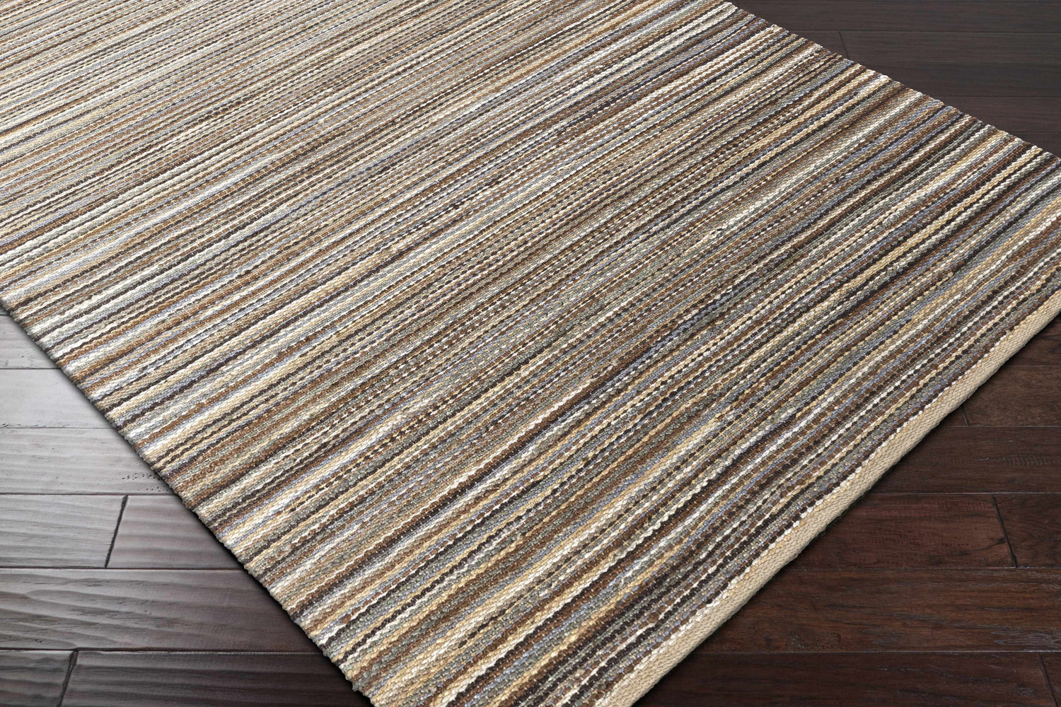 Close-up of Weymouth Jute Rug showing hand woven texture and striped pattern in cream, tan, teal, and black colors. Corner