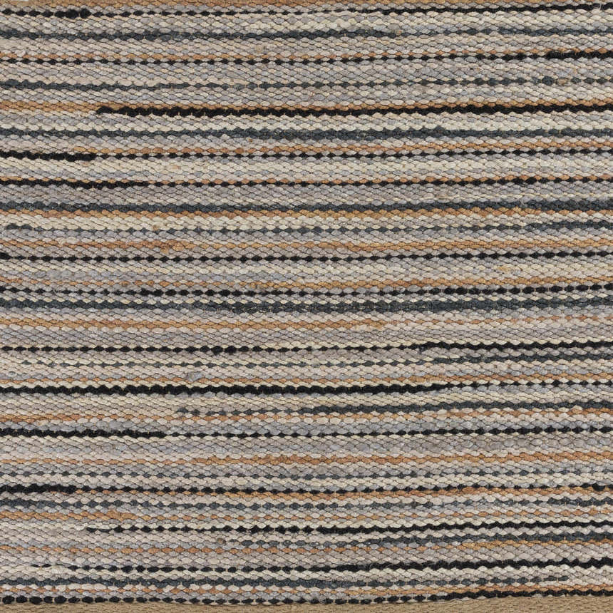 Close-up of Weymouth Jute Rug showing hand-woven texture and stripes in black, cream, tan, and teal. Swatch