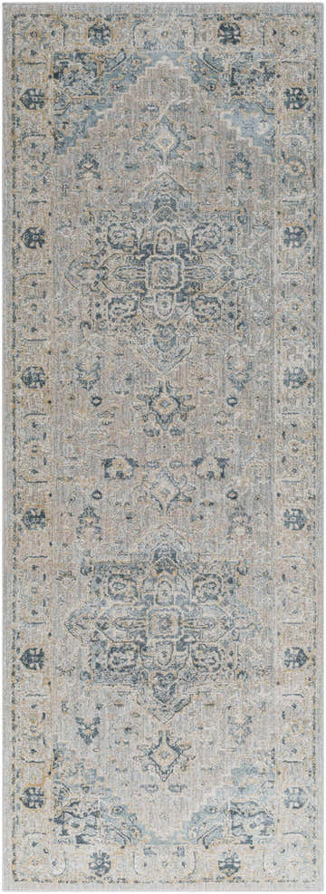 Close-up of the Whangamata Thick Luxe Boutique Rug. Features a traditional pattern in dusty sage, light gray, and pale blue tones. Design-Runner-2773