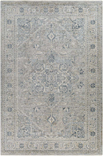 Close-up of the Whangamata Thick Luxe Boutique Rug. Features a traditional design in dusty sage, light gray and pale blue. Design-Rectangle-6796