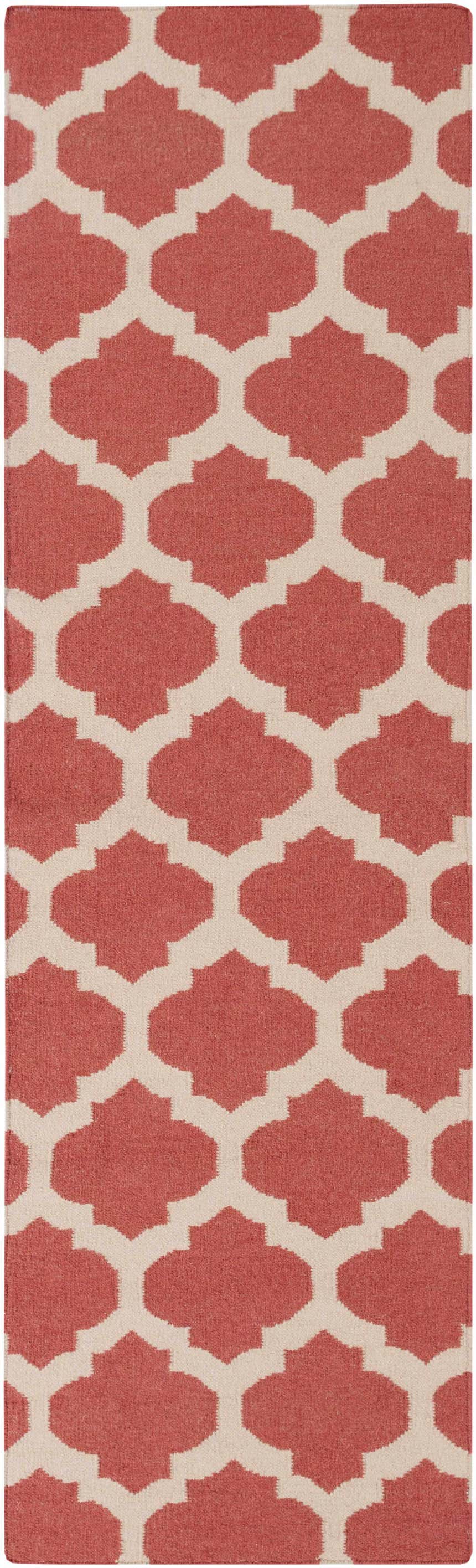 Close-up of the Whitelaw Area Rug. Hand-woven wool rug with a geometric pattern in rose pink and beige. Design-Runner-268