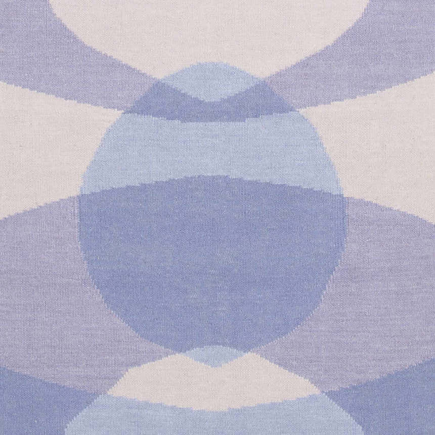 Close-up of the hand woven Whitnash Area Rug. Contemporary wool rug with a pattern of light blue, lavender, and white geometric shapes. Swatch