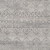 Close-up of the Whitesboro Gray Area Rug featuring a geometric, Bohemian-inspired pattern in charcoal, gray, and white. Swatch