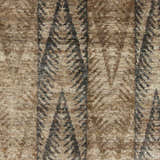 Close up of the hand knotted Wilburton Jute Carpet showing the brown jute texture and contemporary tree pattern. Swatch