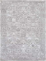 Close-up of the Winstonville Clearance Rug, showcasing its gray floral pattern and traditional border design. Design-Rectangle-710103