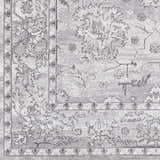 Close up of the Winstonville Clearance Rug featuring a gray and white traditional floral design. Swatch