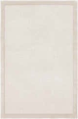 Close-up of the hand-tufted Winooski Area Rug. Cream and light gray wool rug with a subtle striped texture. Design-Rectangle-576