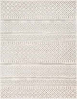 Close-up of the Winston Area Rug. Cream rug with a geometric, bohemian-inspired pattern in medium gray and slate. Design-Rectangle-710103