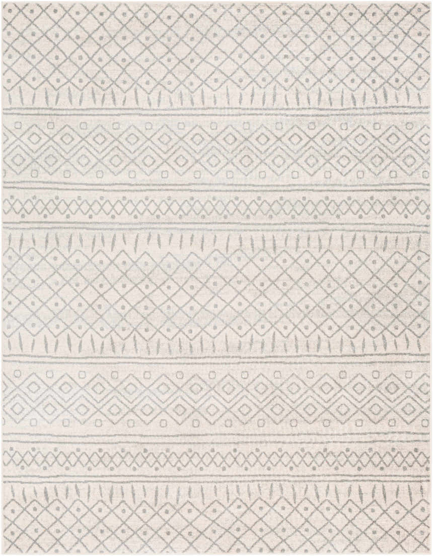 Close-up of the Winston Area Rug. Cream rug with a geometric, bohemian-inspired pattern in medium gray and slate. Design-Rectangle-710103