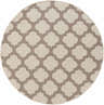 Close-up of the round Winterville Area Rug. Beige rug with a dark red quatrefoil pattern. Farmhouse style. Design-Round-73