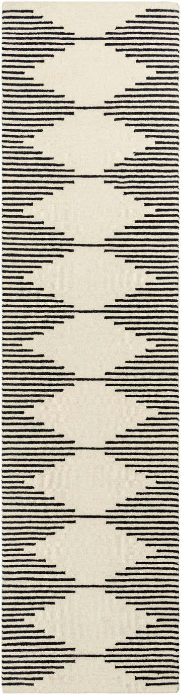 Close-up of Walkerston rug. Hand-tufted wool rug with a beige background and bold black geometric stripes. Design-Runner-2610