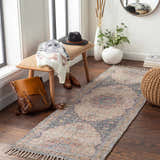 Entryway with Wallburg Hand Woven Colorful Tassel Rug, wood bench, brown leather backpack, and round mirror. Roomscene-Runner