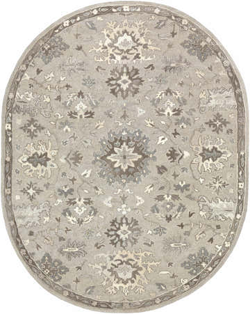 Close-up of the oval Willimantic Beige Thick Wool Rug. Features a traditional floral pattern in beige, brown, and taupe hues. Design-Oval-810
