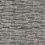 Close-up of the hand-knotted Willmar Premium Rug. Denim, ink blue, light olive, and sage colors create a contemporary design. Texture