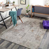 Home office with gray wood floors and Windale Textured Luxe Area Rug in brown, gray, and off-white. Roomscene-Rectangle