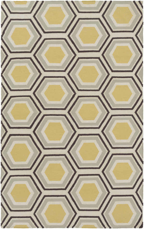 Close-up of the Winneconne Area Rug. Features a geometric hexagon pattern in black, peach, and tan. Hand woven wool rug. Design-Rectangle-58
