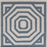 Close-up of Westbrook Area Rug: hand-woven wool with geometric pattern in dark blue and light gray. Swatch