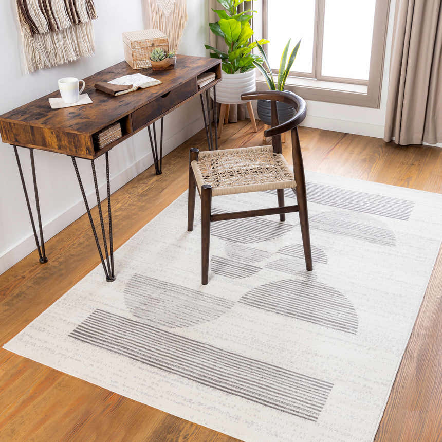 Home office scene with Westcourt Area Rug in dark gray and white geometric pattern. Roomscene-Rectangle