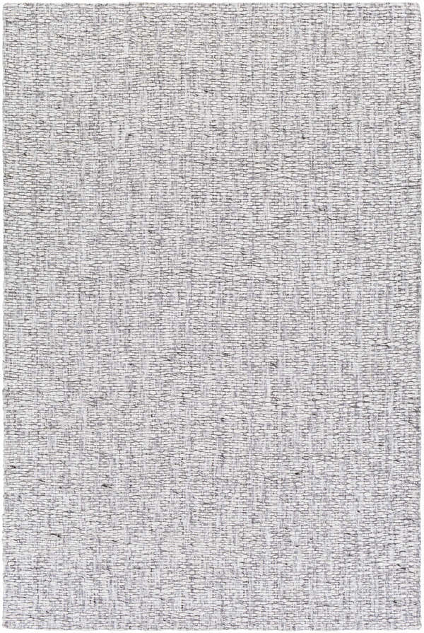 Close-up of the hand-loomed Westoning Area Rug. Black, charcoal, light gray, and off-white woven texture. Design-Rectangle-576