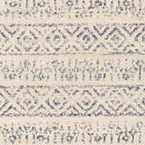 Close-up of the Westborough Beige Area Rug, featuring a contemporary geometric pattern in beige, cream, and blue. Swatch
