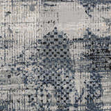 Close-up of the Waterboro Area Rug showing its contemporary abstract design in shades of gray, blue, ivory and black. Swatch