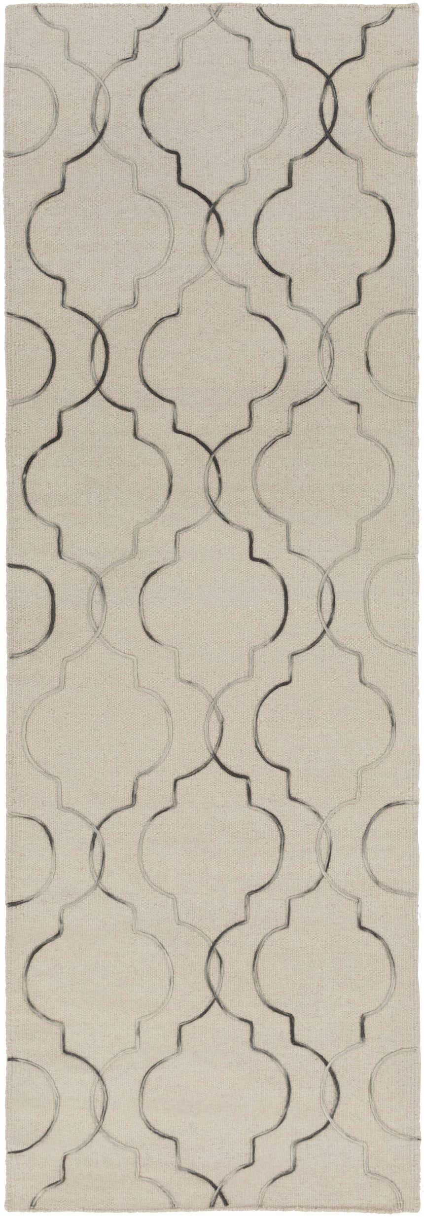 Close-up of Wycombe Area Carpet Rug. Hand-woven wool rug in light gray with a black and taupe quatrefoil pattern. Design-Runner-268