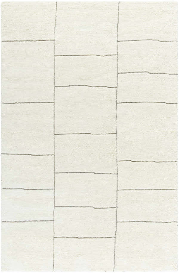 Close-up of the Xylia Charcoal Area Rug. Off-white wool rug with a contemporary block pattern and light silver accents. Design-Rectangle-576