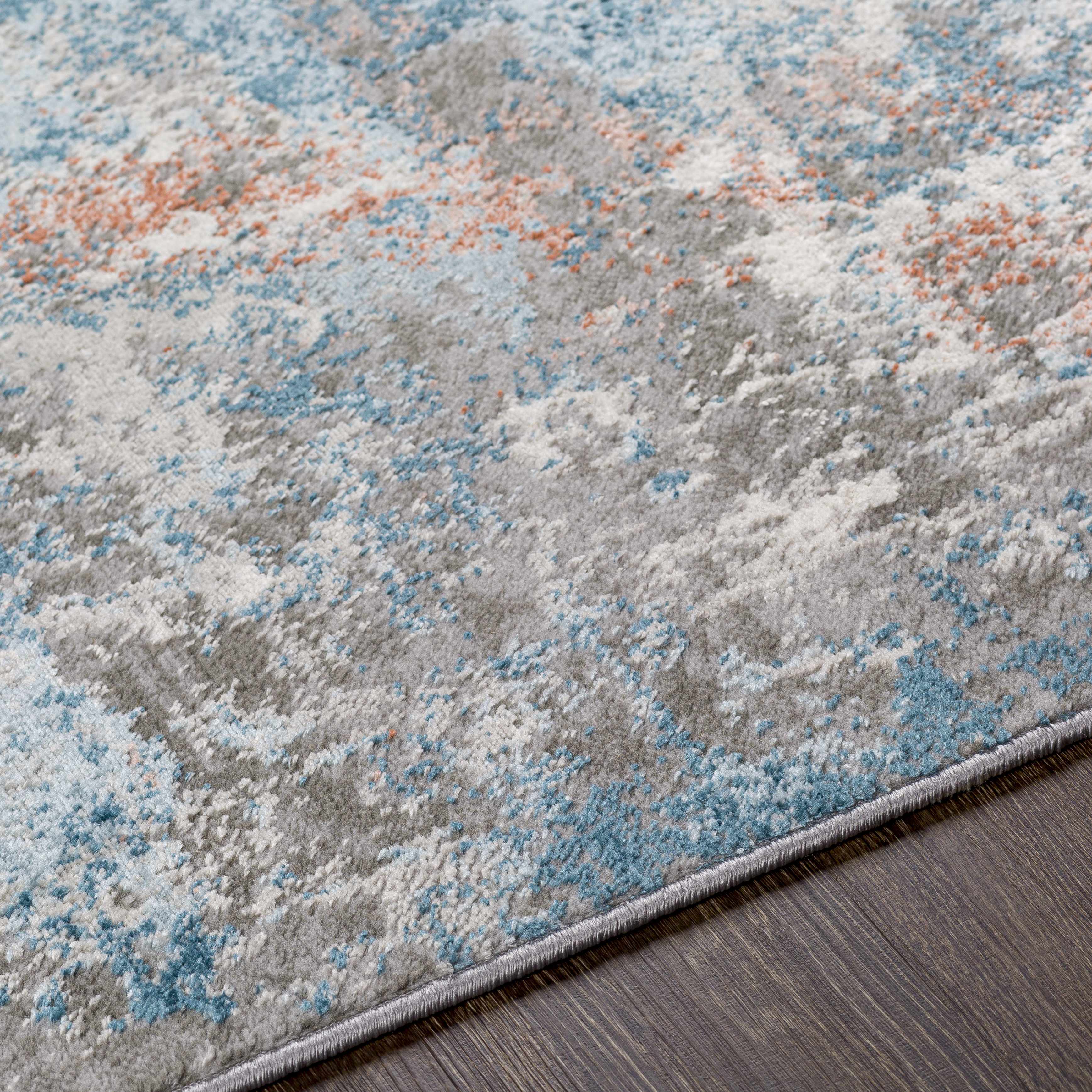 Close-up of the texture on Yakutiye  Area Rug - Clearance, showing fabric weave and feel. Contemporary Area Rug Backing  