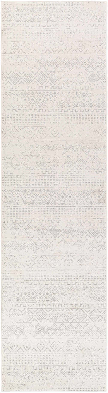Close-up of the Yamanto Area Rug. Gray and white tones with a subtle, geometric, bohemian-inspired pattern. Design-Runner-2710