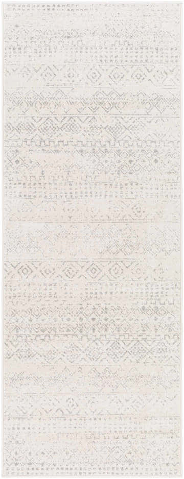 Close-up of the Yamanto Area Rug. Bohemian style rug in gray, light gray, and white with a geometric pattern. Design-Runner-2773