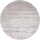 Close-up of round Yemassee Tibetan Striped Area Rug. Charcoal, ivory, gray, and tan horizontal stripes. Design-Round-710