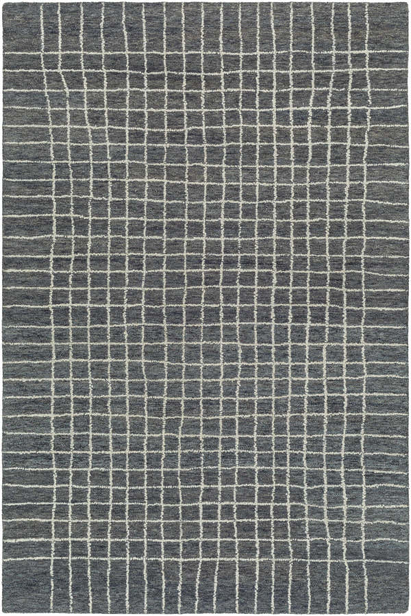 Close-up of the hand-tufted Yates Area Rug. Gray wool rug with a steel gray and white grid pattern. Contemporary style. Design-Rectangle-576