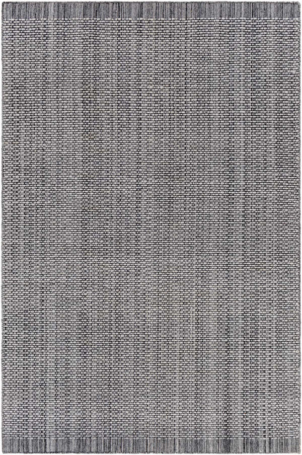 Close-up of the hand loomed Light Gray Area Rug, showing its woven texture and charcoal and cream color variations. Design-Rectangle-576