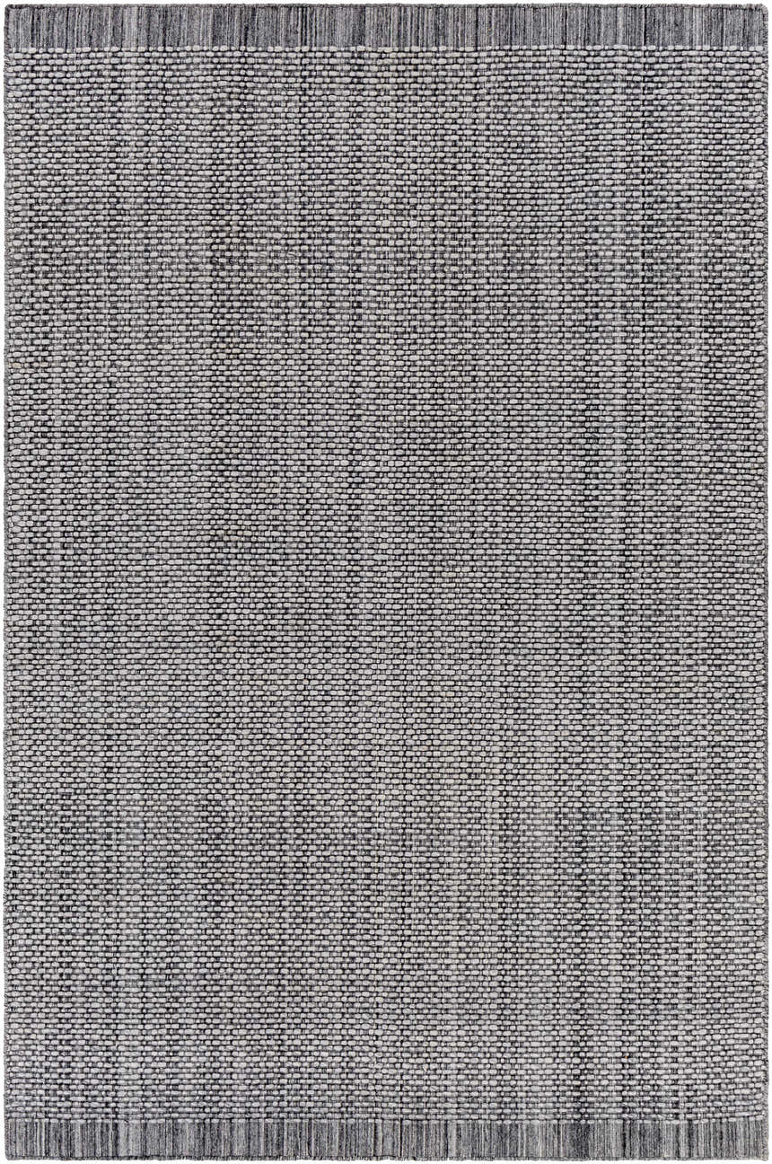 Close-up of the hand loomed Light Gray Area Rug, showing its woven texture and charcoal and cream color variations. Design-Rectangle-576