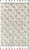 Close-up of the Yarravel Area Rug. Hand-knotted wool rug with a geometric pattern in charcoal, dark brown, and ivory. Tassels on each end. Design-Rectangle-69