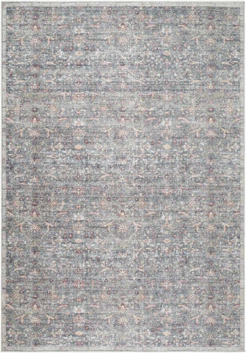 Close-up of the Zilya Area Rug. Machine woven rug with dark brown, green, peach, rust, sage, and white traditional pattern. Design-Rectangle