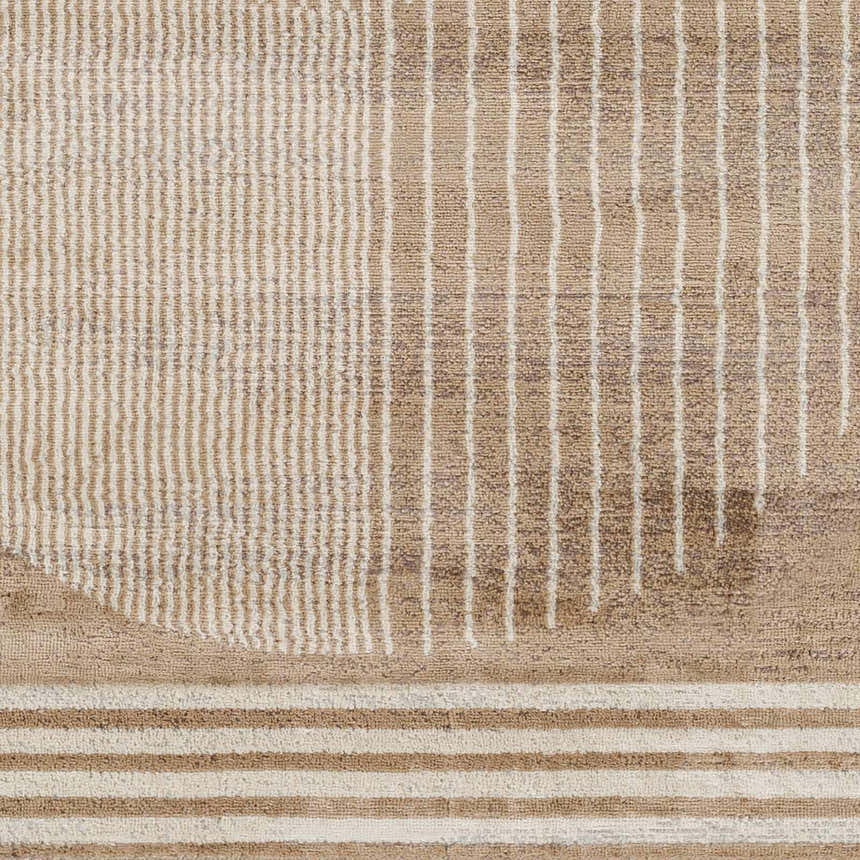 Close-up of the Zeke Area Rug, showcasing a contemporary geometric pattern in bone, mocha, and brown hues. Swatch