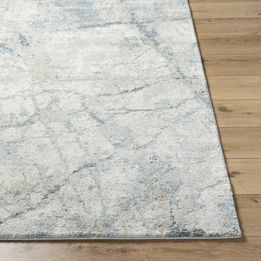 Close up of the Urowo Light Gray Thick Luxe Rug showing its cream, gray, and light blue abstract pattern. Front